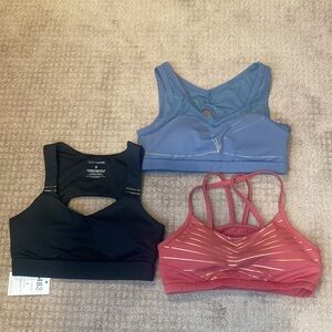 Cleo Harper Set of  3 sports bras Small blue, rose, black, gold